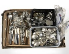 A quantity of loose stainless steel and plated cutlery, sifters, napkin rings,