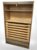 A 20th century Continental tambour front office filing cabinet, with key, 88 cm x 39 cm x 145 cm.