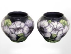 A pair of modern Moorcroft Petunia bulbous vases, dated 2003, numbered 41 of 150 and 82 of 150,