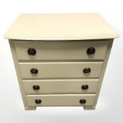 A painted pine four drawer low chest, width 59 cm.