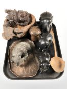 A group of carved ebony elephants, black forest style bear holding a fish, bust,