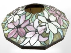 A Tiffany style leaded and stained glass light shade,
