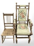 An early 20th century rocking chair with tapestry upholstered seat and a further smaller rocking
