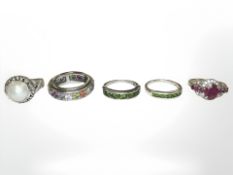 Five silver gem-set rings