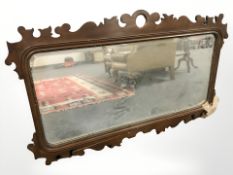 An Edwardian mahogany mirror in the Chippendale style,