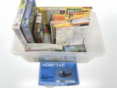 A quantity of Ordnance Survey maps, Revell modelling kit, plus two others and two jigsaws.