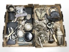 A collection of silver plated wares including cutlery, cocktail shaker,