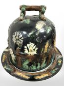 A Majolica cheese dish and cover, height 27 cm.