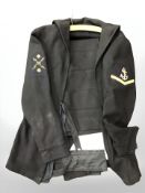 A Naval tunic and trousers.