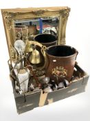 A reproduction gilt frame mirror, leather shell carrier with coat of arms, brass table bell,