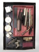 A group of fountain pens, Colibri lighter, Smiths pocketwatch plus another, two wristwatches,