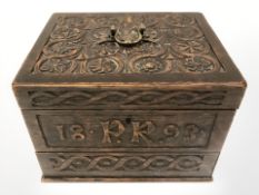 A 19th century carved oak jewellery box, fitted a drawer.