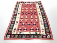 A Turkish Kilim, 260 cm x 167 cm.
