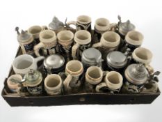 A collection of pottery steins.