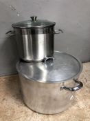 Two stainless steel cooking pots, largest 47 cm diameter.