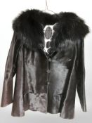 A lady's cowhide jacket retailed by Renee of London.