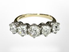 An 18ct yellow gold five stone old brilliant cut diamond ring, size L, 4.1g.