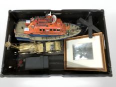 A remote control model RNLI lifeboat, a brass scale model of Stephenson's Rocket,
