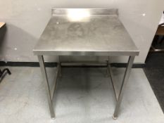A stainless steel commercial kitchen preparation table, 75 cm x 76 cm x 88 cm,