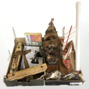 A group of model ships, ships in bottles, wooden model of an aeroplane,