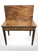 A 19th century mahogany fold over top tea table,