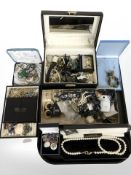 Several jewellery boxes containing costume jewellery, gold plated chains, lady's wristwatches,