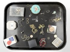 A group of silver and costume jewellery, compact, cuff links,