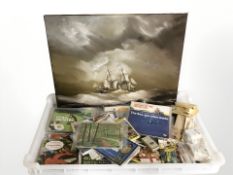 A quantity of Brooke Bond collector's cards and a unframed oil on canvas of a British ship in rough