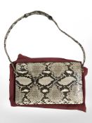 A lady's vintage snakeskin handbag, width 33 cm.