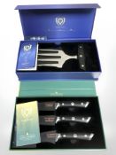 A Dalstrong gladiator series three piece culinary knife set and a further meat claw, both boxed.