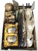 A group of dolls, decorative Eastern style masks, figures, miniature globe, treen money box, etc.