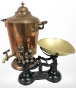 A Victorian copper samovar, height 45 cm, together with a set of scales with weights.
