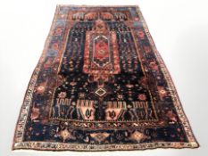 A Nahavand carpet, North-West Iran, 301 cm x 163 cm.