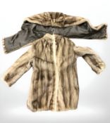A lady's mink coat and matching shawl.