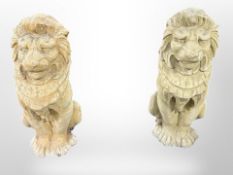 A pair of concrete garden lions,