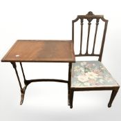 A reproduction mahogany occasional table and an occasional chair