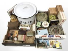 An enameled bread bin, babushka doll, vintage camera, tins, cigar boxes, etc.