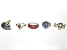 Five silver gem-set rings