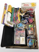 Pokemon collectibles including cards, books, figurine, etc.