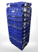 Eleven stackable plastic storage boxes,