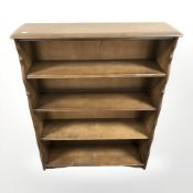 A reproduction open bookcase, width 91 cm.