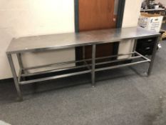 A commercial stainless steel kitchen prep table, 240 cm x 60 cm x 86 cm.