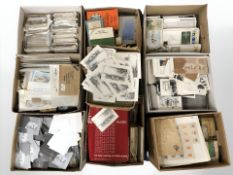 A vast quantity of 20th century and modern postcards, loose stamps,