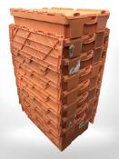 Eight stackable plastic storage boxes,