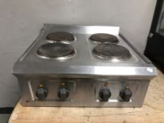 A stainless steel commercial counter top stove.