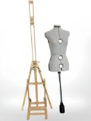 An adjustable easel and a female adjustable mannequin torso on stand.