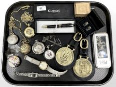 A group of modern pocket watches, wristwatches, cuff links, music box, horse brasses,