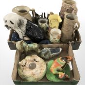 A group of ceramics including tankards and jugs, animal figures, etc.