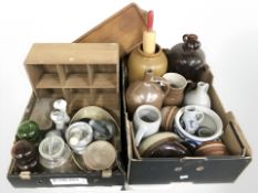 A small teak open wall shelf, glass storage jars, granite pestles and mortars,