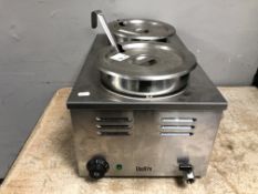 A Quattro commercial stainless steel double soup kettle.